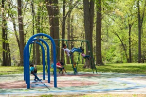 Swinging at the East Parkway playground